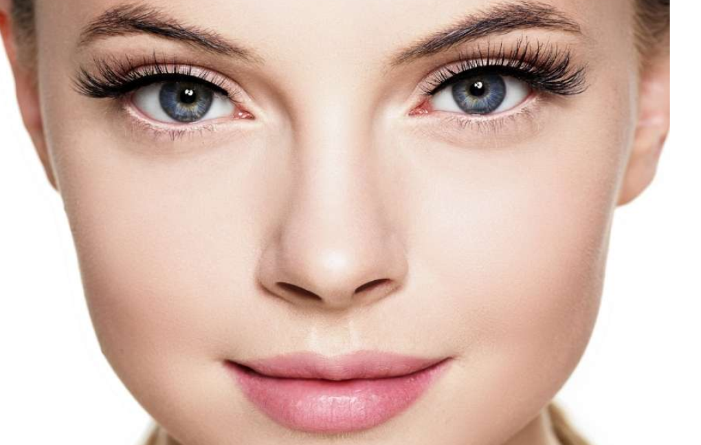 woman wearing wispy, black lash extensions