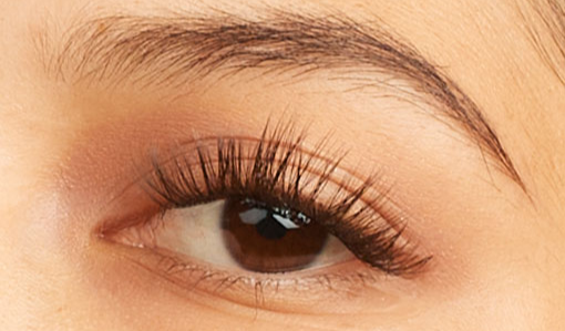  person's eye with wispy lash extensions